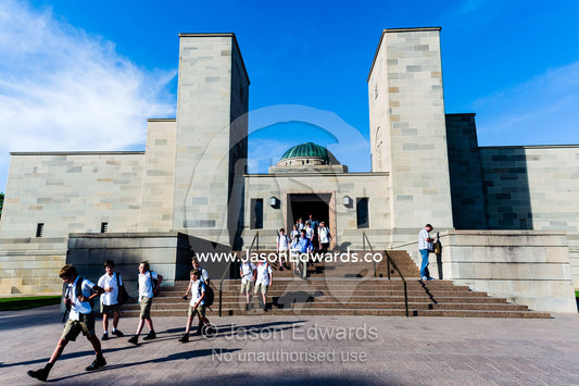 School children exit the Australian War Memorial after a educational school excursion. Australian War Memorial, Canberra, Australian Capital Territory, Australia.