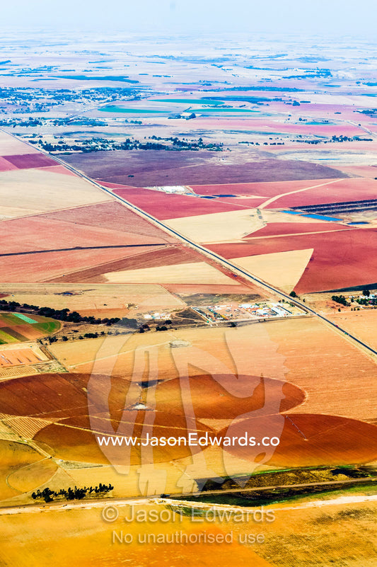 Dry and arid farmland surrounding agricultural crop circles. Johannesburg, Gauteng Province, South Africa, Africa.
