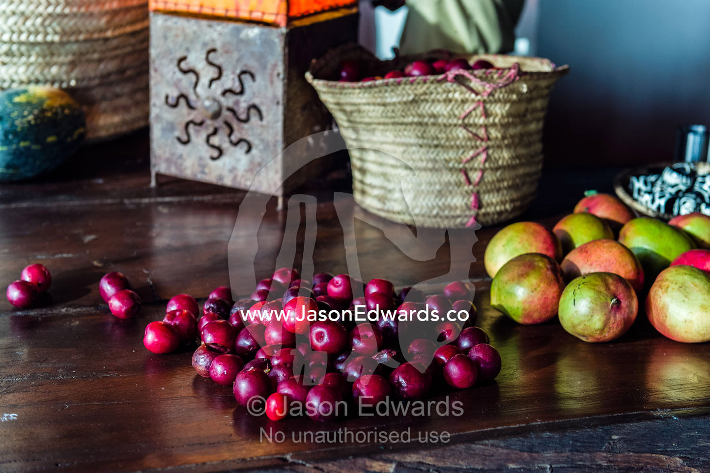 Fresh Plums and White Nectarines resting on a shelf in a breakfast dining room. Karatu, Rhotia Valley Lodge, Rhotia Valley, Karatu District, Arusha Region, Tanzania.