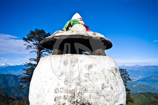A large stone incense urn on a mountain pass in the Himalaya. 108 Druk Wangyal Khangzang Chortens, Dochula Pass, Thimphu District, Bhutan.
