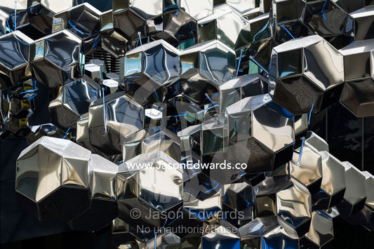 A stainless steel sculpture  reflecting lights in an airport terminal Kuala Lumpur International Airport, Sepang District, Selangor, Malaysia
