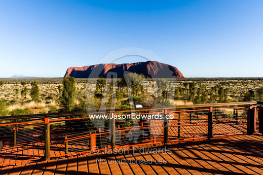 Viewing platforms give tourists an opportunity to see above the desert plain to Uluru. Uluru Kata Tjuta National Park, Northern Territory, Australia.