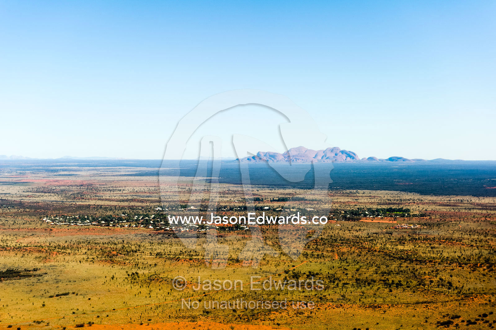 The ochre domes of Kata Tjuta rise from a vast desert plain in Australia's Outback. Uluru Kata Tjuta National Park, Northern Territory, Australia.