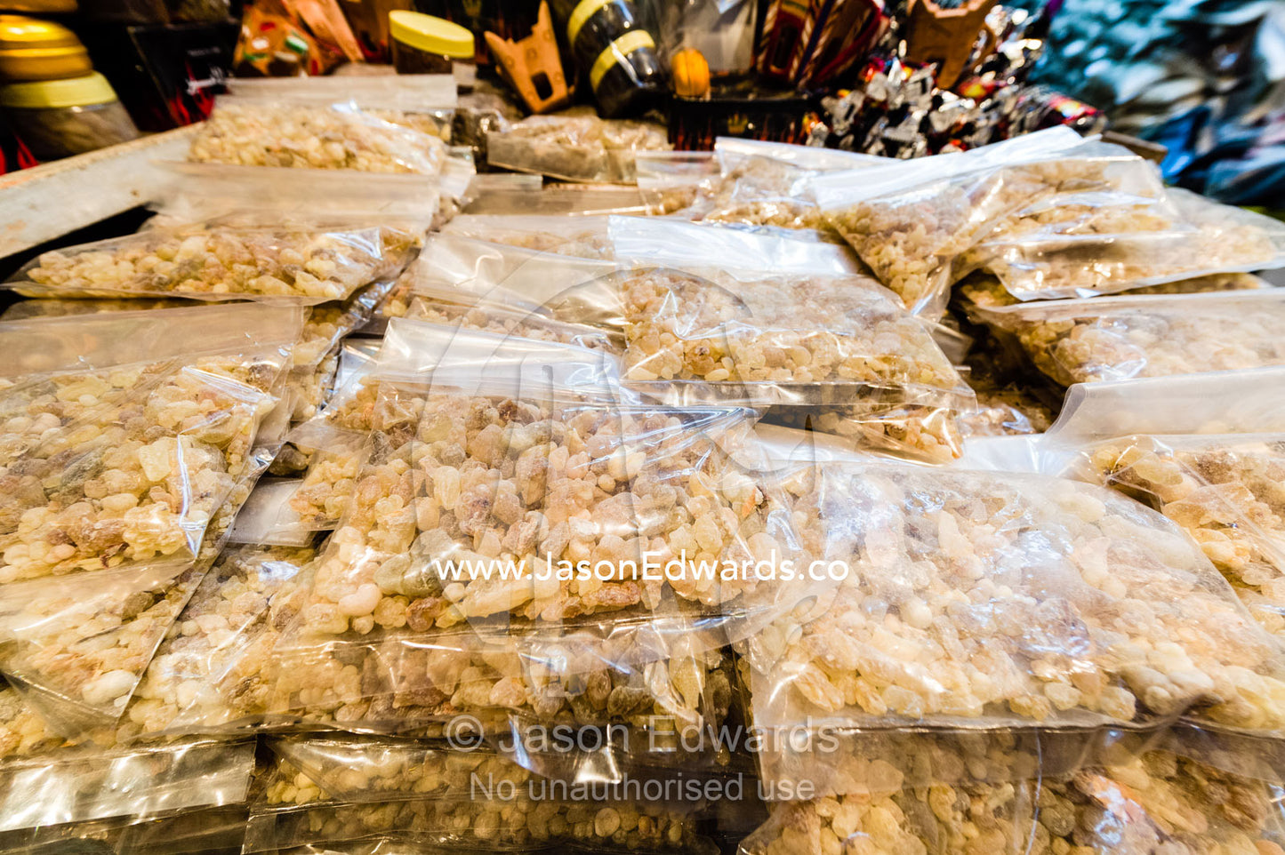 Bags of aromatic frankincense for sale in a market shop. Muscat, Sultanate of Oman.