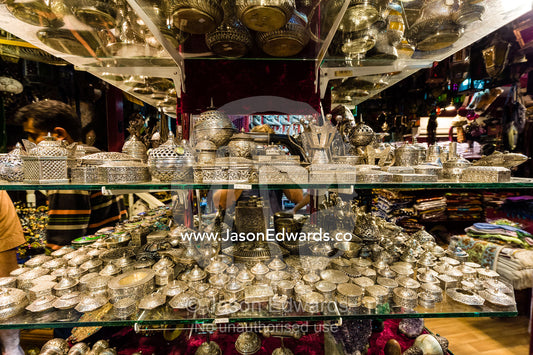 A shop in a market displays and sells varieties of silver bracelets and jewellery boxes. Mutrah Souq, Muscat, Sultanate of Oman.