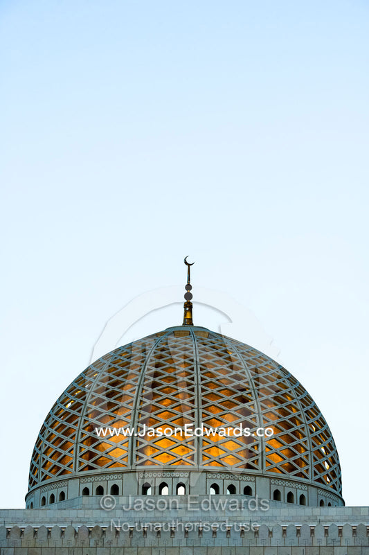 A crescent moon sits atop the dome of the Prayer Hall in the Grand Mosque in Muscat. Sultan Qaboos Grand Mosque, Muscat, Sultanate of Oman.