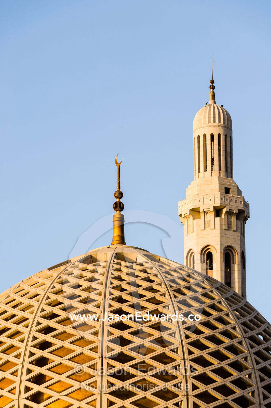 A crescent moon sits atop the dome of the Prayer Hall in the Grand Mosque in Muscat. Sultan Qaboos Grand Mosque, Muscat, Sultanate of Oman.