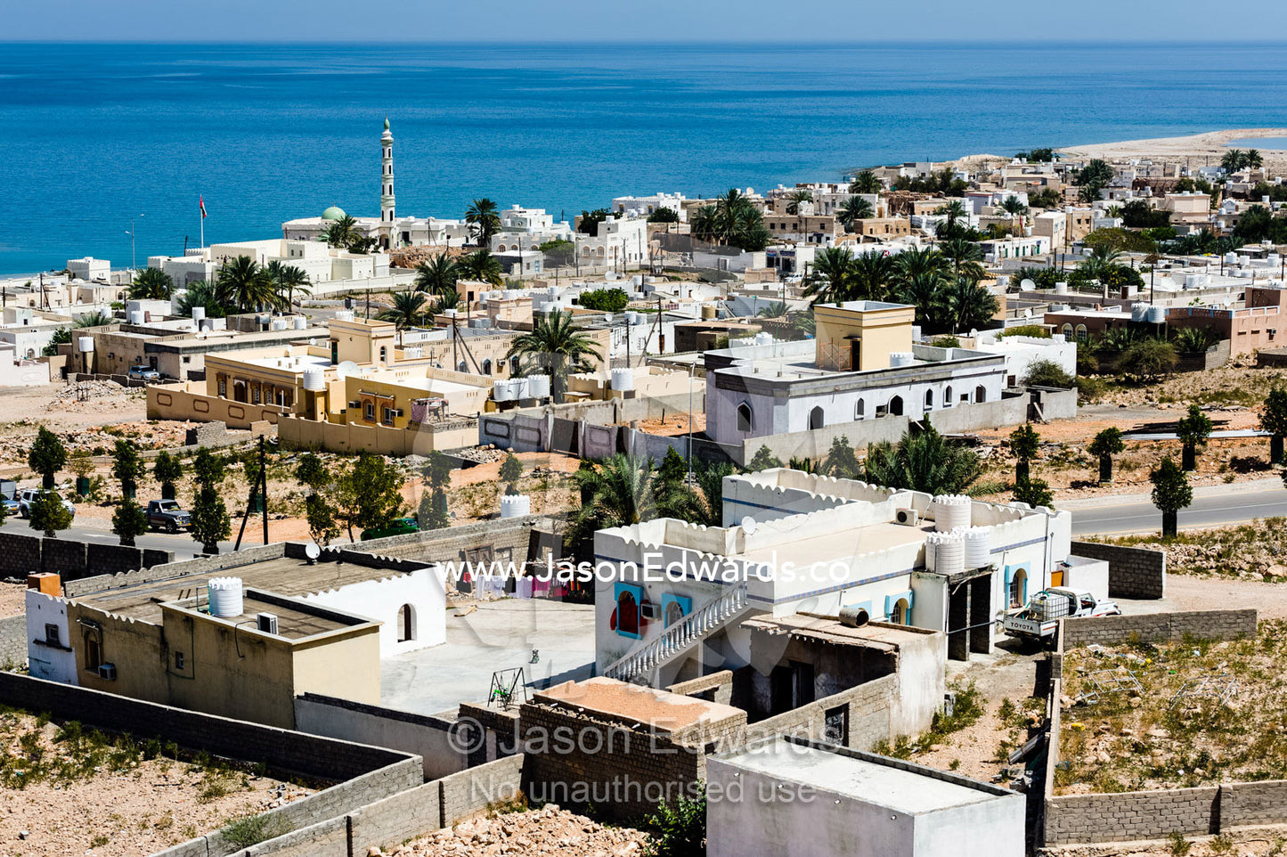 The homes and community compounds of Tiwi Town along the coast of the Gulf of Oman. Tiwi Town, Wadi Tiwi, Sultanate of Oman.