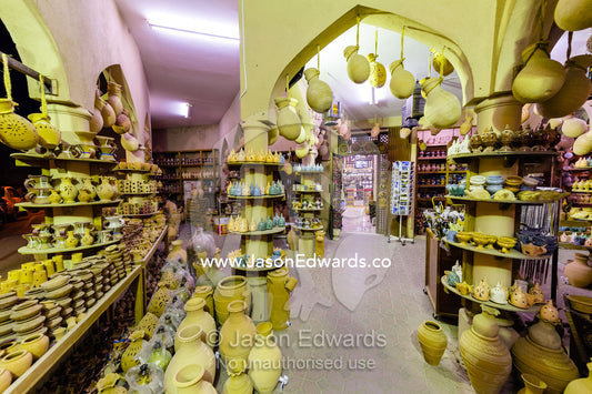 A display of ceramic pots and vases for sale in a souq. Mutrah Souq, Muscat, Sultanate of Oman.