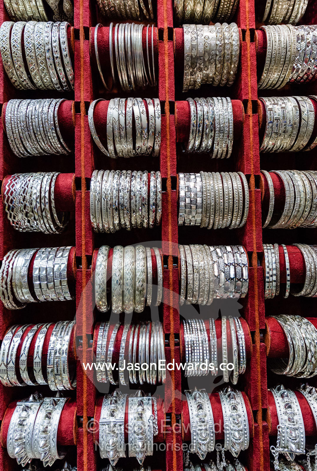 A display of silver bracelets for sale in a souq. Mutrah Souq, Muscat, Sultanate of Oman.