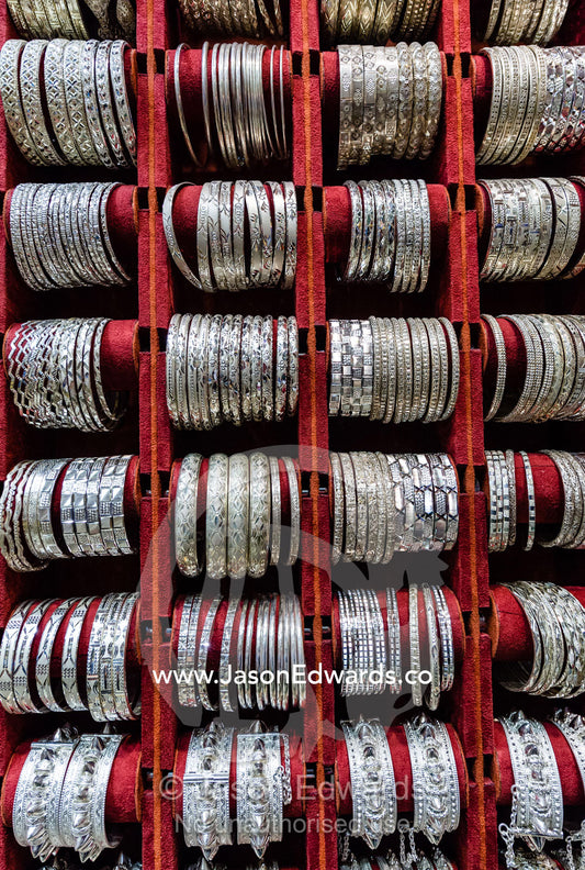 A display of silver bracelets for sale in a souq. Mutrah Souq, Muscat, Sultanate of Oman.