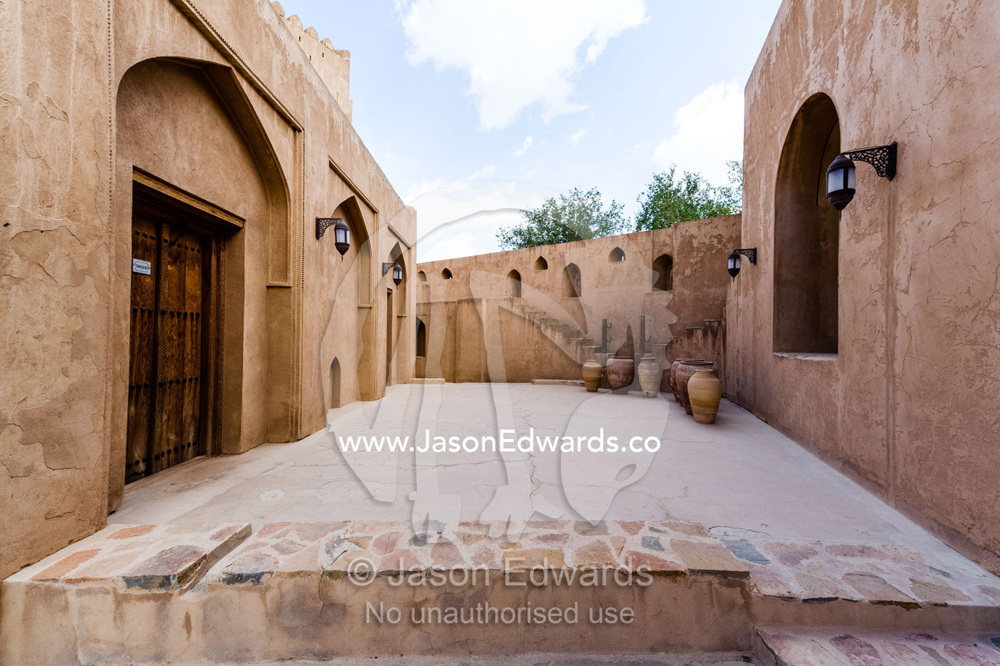 An interior courtyard between wings in an ancient fort. Jabrin Fort, Ad Dakhiliyah Governorate, Sultanate of Oman.