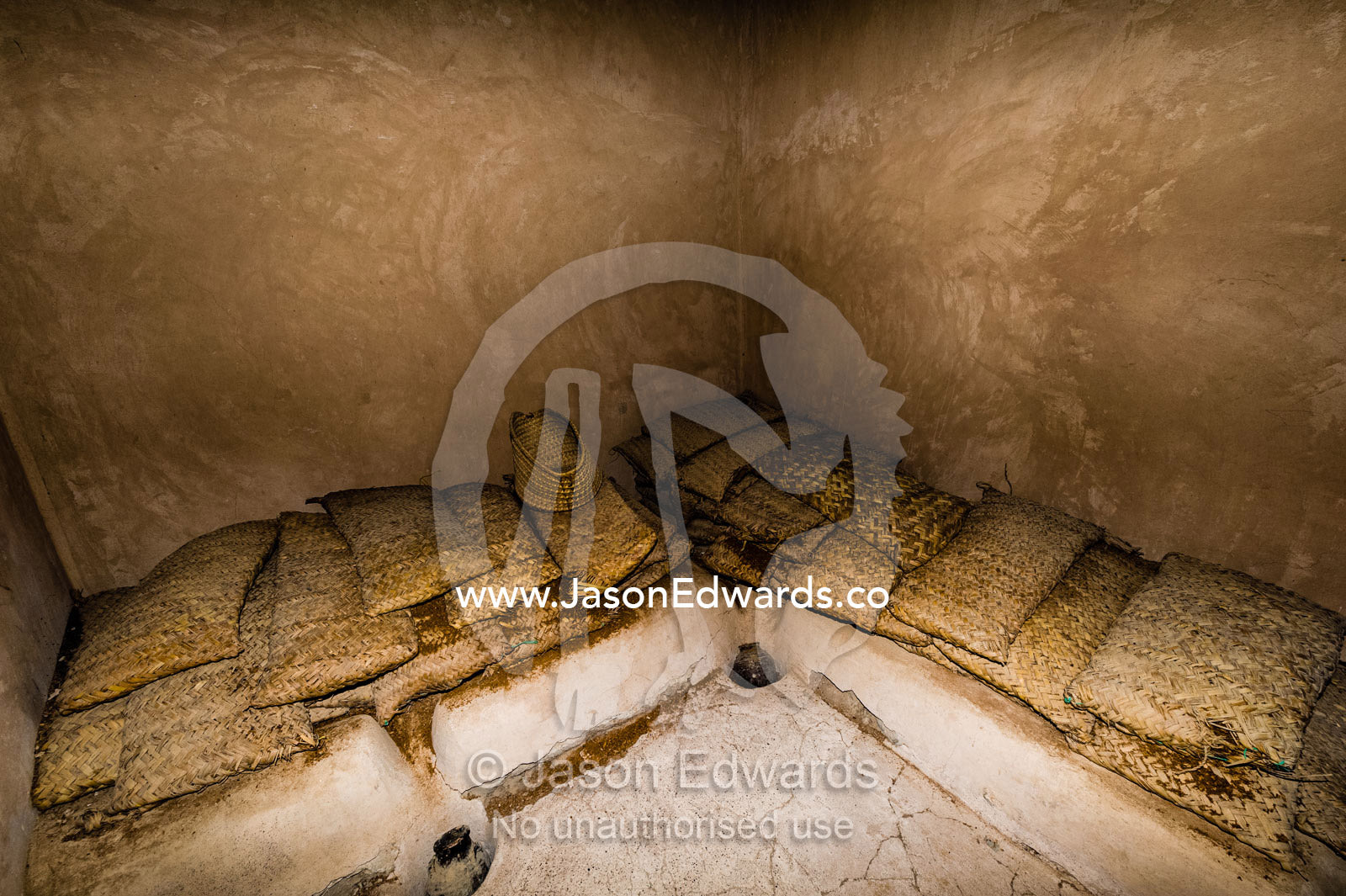 Date bags in a storage room in an ancient fort where the date juice is collected. Nakhal Fort, Wilayt Nakhal, Mount Nakhal, Al Batinah South Governorate, Sultanate of Oman.