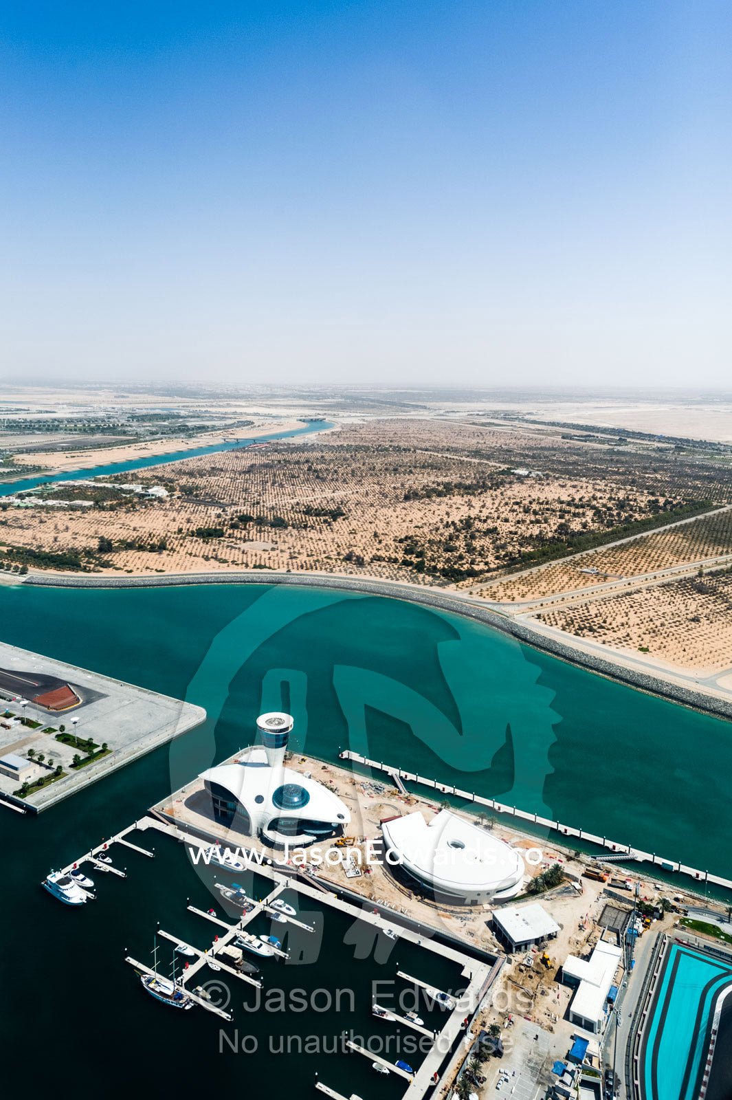 The architecture, boat marina and race track of the Yas Marina Circuit in Abu Dhabi. Yas Marina Circuit Abu Dhabi, Emirate of Abu Dhabi, Abu Dhabi, Persian Gulf, United Arab Emirates.