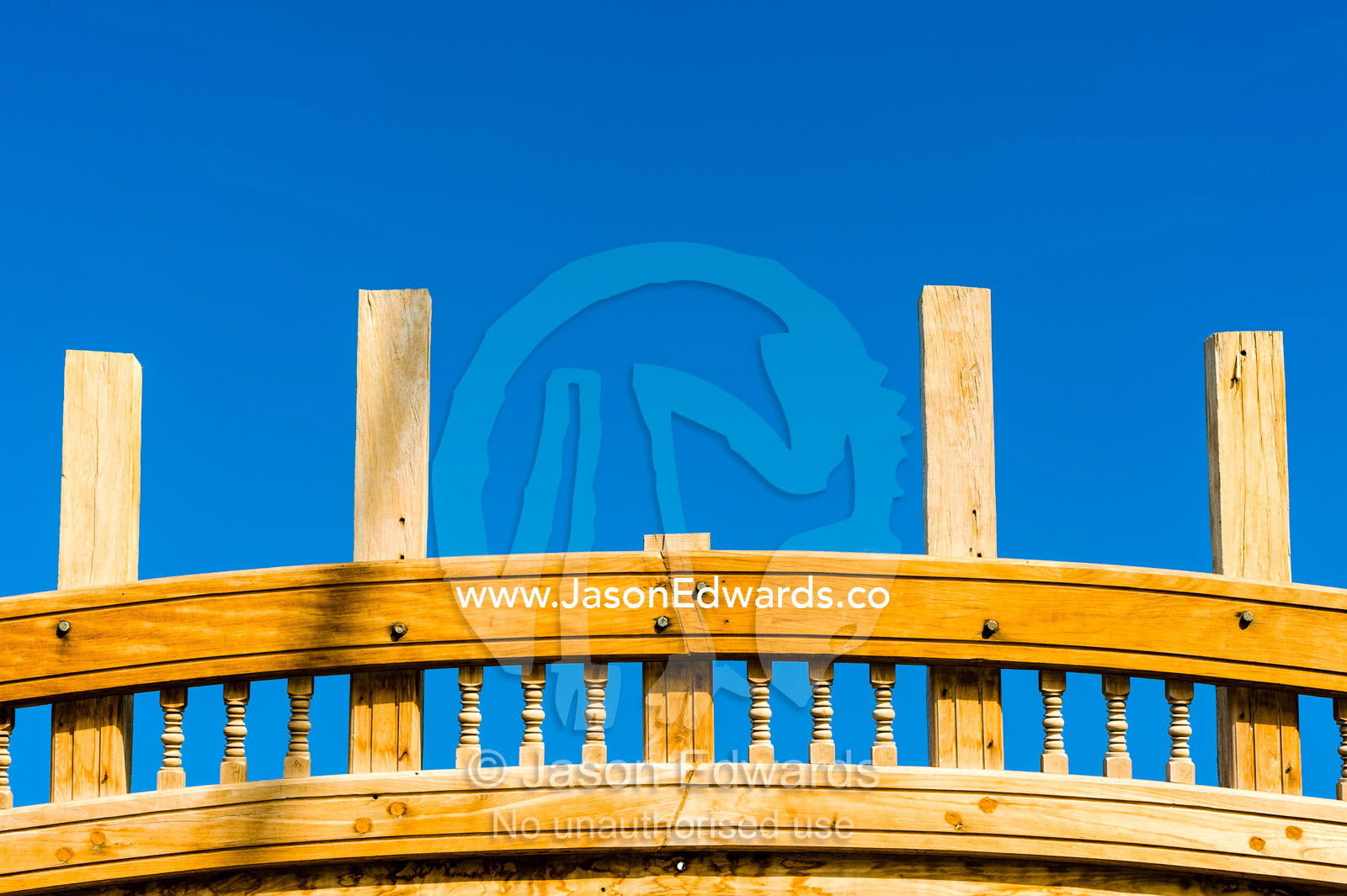 An elaborate carved timber taffrail on the stern of a dhow during construction. Sur, Ash Sharqiyah Region, Gulf of Oman, Sultanate of Oman.