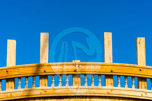 An elaborate carved timber taffrail on the stern of a dhow during construction. Sur, Ash Sharqiyah Region, Gulf of Oman, Sultanate of Oman.