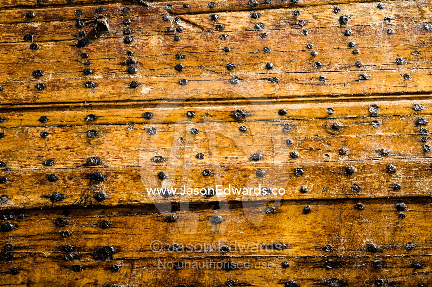 Lacquered nails and planks seal the hull of Fateh al-Khair, the last surviving dhow of the pre-oil era. Sur, Ash Sharqiyah Region, Gulf of Oman, Sultanate of Oman.