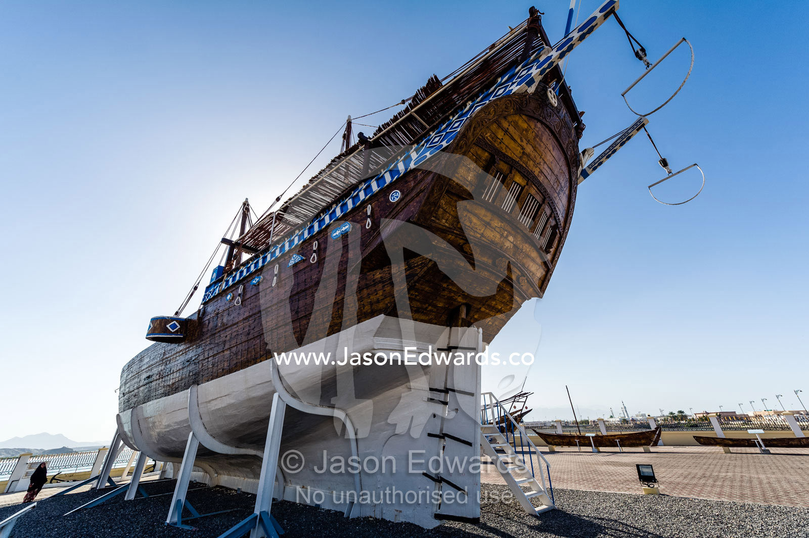 The stern, rudder and hull of the Fateh al-Khair, the last surviving dhow of the pre-oil era. Sur, Ash Sharqiyah Region, Gulf of Oman, Sultanate of Oman.