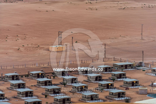 Accommodation at a desert camp resting between two sand dunes. Wahiba Sands, Ramlat al-Wahiba, Sharqiya Sands, Sultanate of Oman.