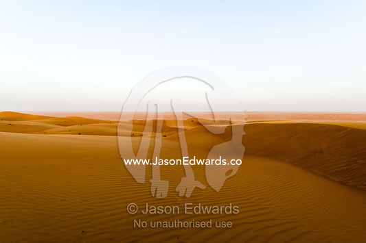 The plateau of a sand dune as night falls over the desert. Wahiba Sands, Ramlat al-Wahiba, Sharqiya Sands, Sultanate of Oman.