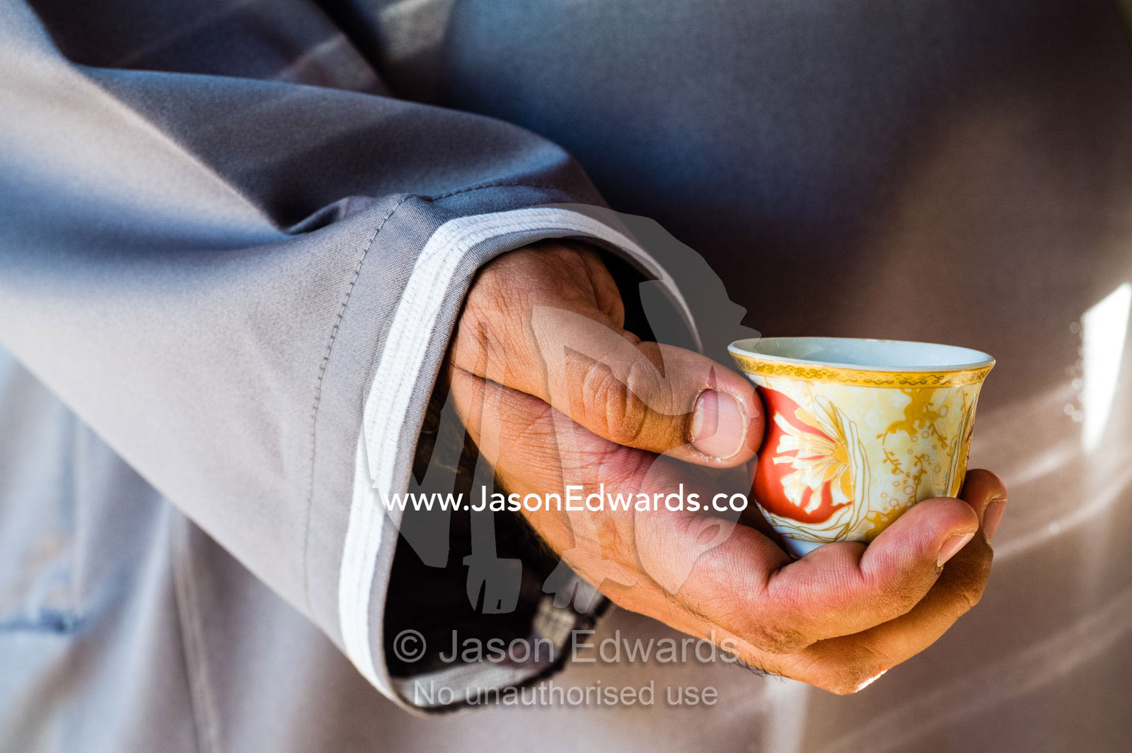 Traditional coffee, gahwa, is a hospitality ritual involving handleless cups. Misfat Al Abryeen, Al Hajar Mountains, Al Hamra, Ad Dakhiliyah Region, Sultanate of Oman.