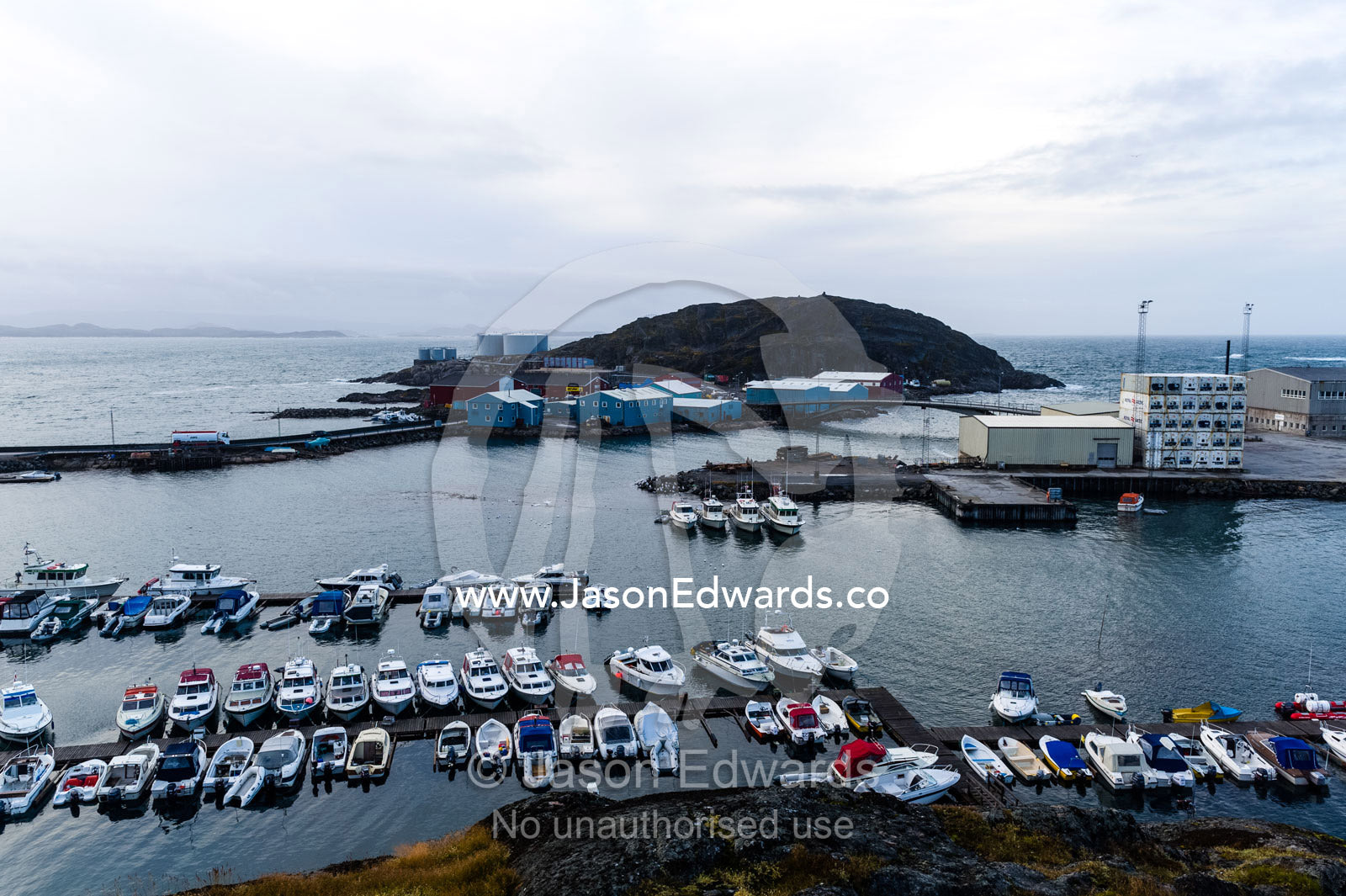 Fishing and recreational boats moored in a fishing town port. Maniitsoq, Sukkertoppen, Qeqqata Municipality, Greenland.