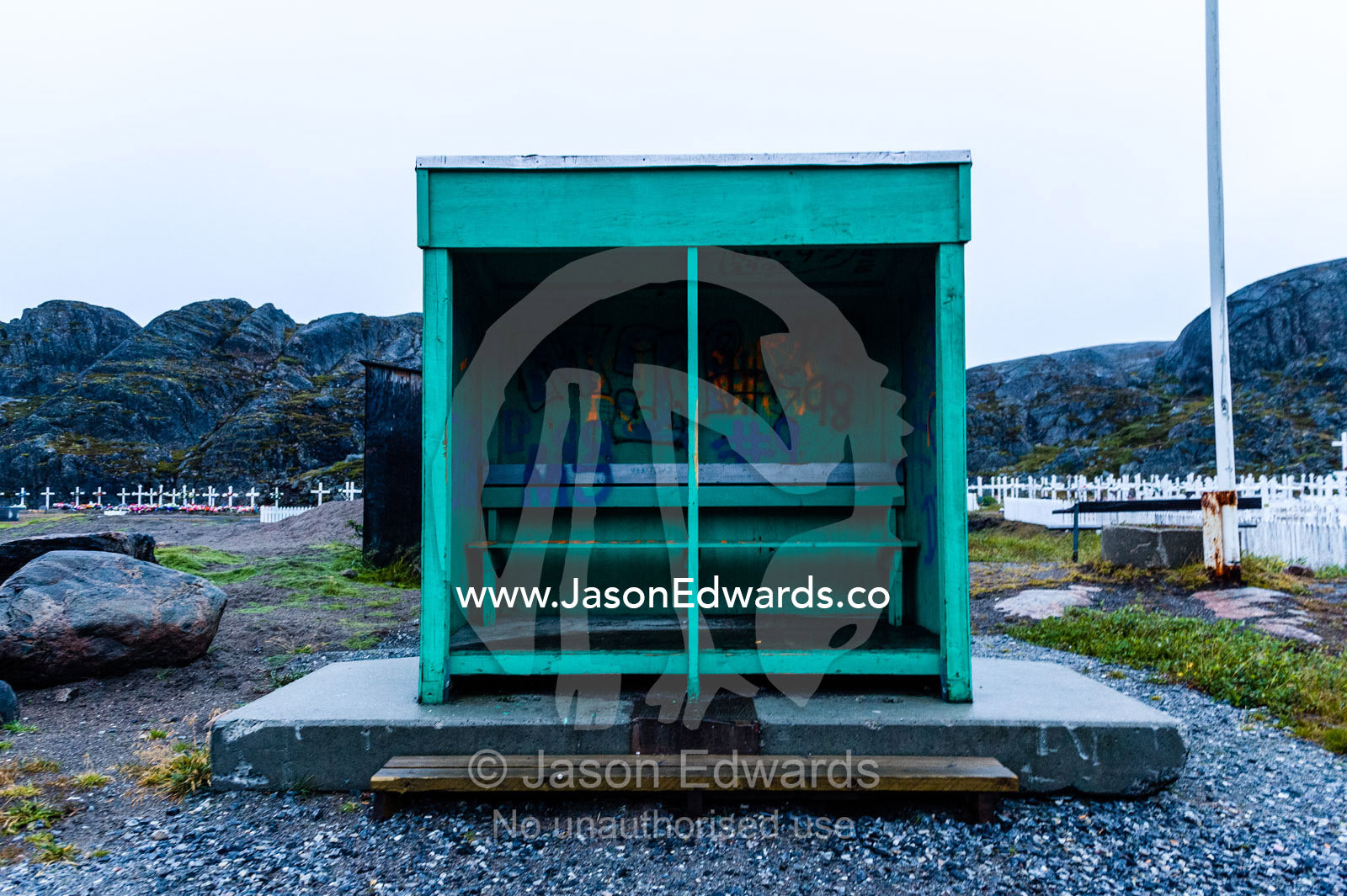A bus stop on a rainy evening in a remote fishing village. Maniitsoq, Sukkertoppen, Qeqqata Municipality, Greenland.