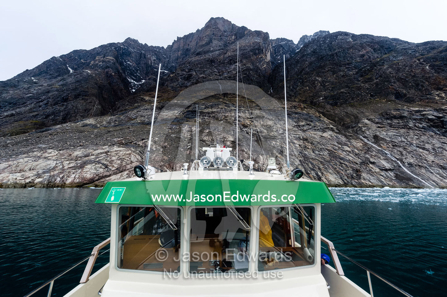 The bridge of a boat travelling through a fiord. Fjord of Eternity, Maniitsoq, Sukkertoppen, Qeqqata Municipality, Greenland.
