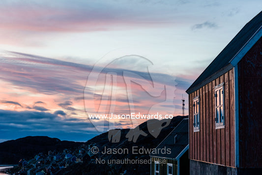 A fisherman's cottage in an Antarctic village at night. Kangaamiut, Gammel Sukkertoppen, Qeqqata Municipality, Greenland.