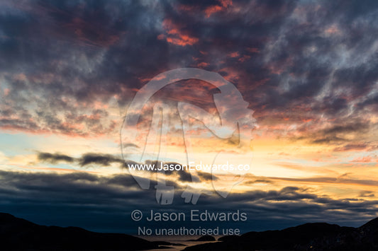 Sunset over the rugged coast of an Arctic island. Kangaamiut, Gammel Sukkertoppen, Qeqqata Municipality, Greenland.