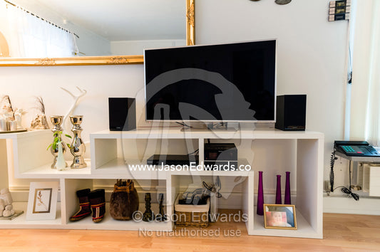 A TV and stereo system on display in a modern Greenlander home. Kangaamiut, Gammel Sukkertoppen, Qeqqata Municipality, Greenland.