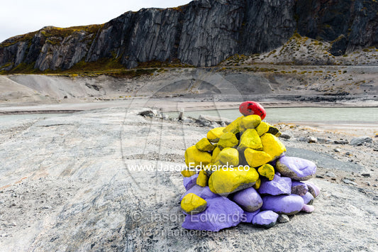 A pile of colourful rocks painted by children in an arctic village. Kangerlussuaq, Qeqqata Municipality, Greenland.