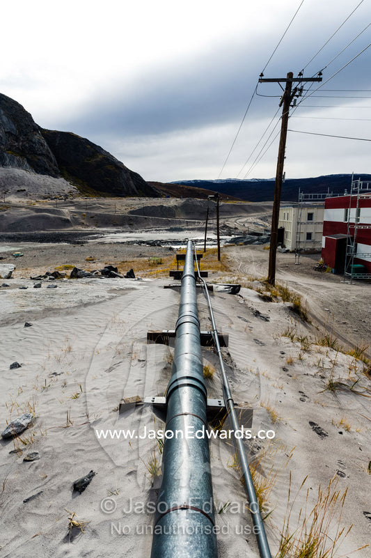 A pipeline supplies gas to an arctic village to heat homes. Kangerlussuaq, Qeqqata Municipality, Greenland.