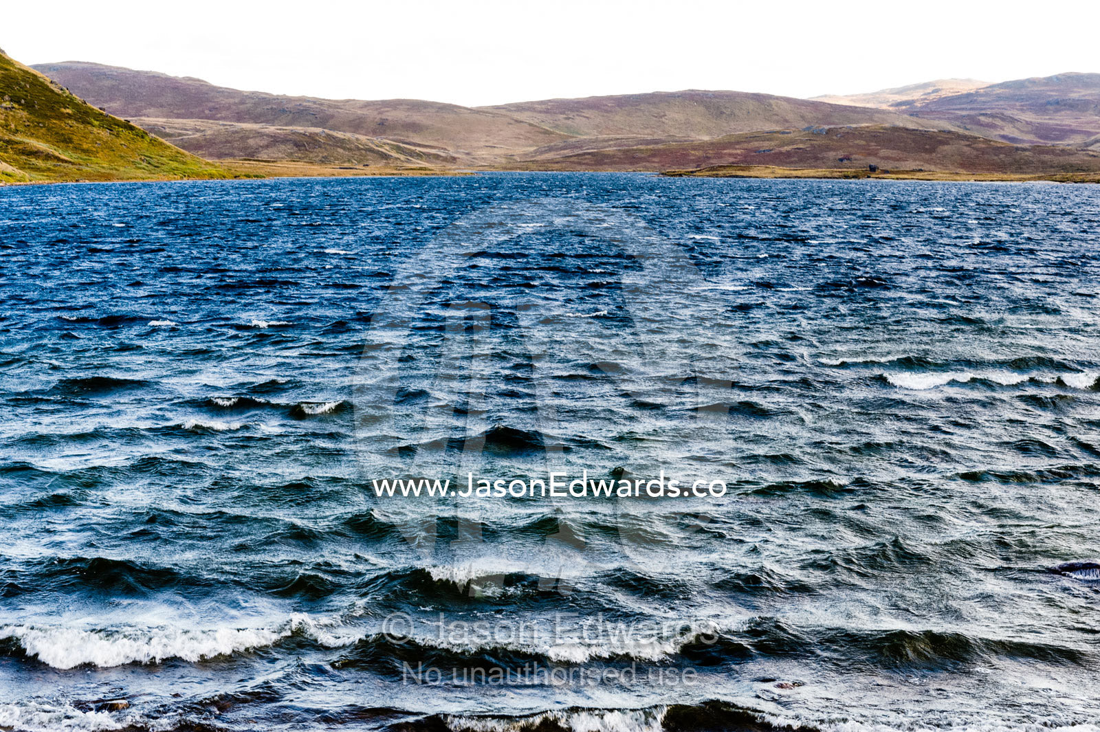 Waves on the windswept surface of an alpine lake. Isunngua Highland, Kangerlussuaq, Qeqqata Municipality, Greenland.