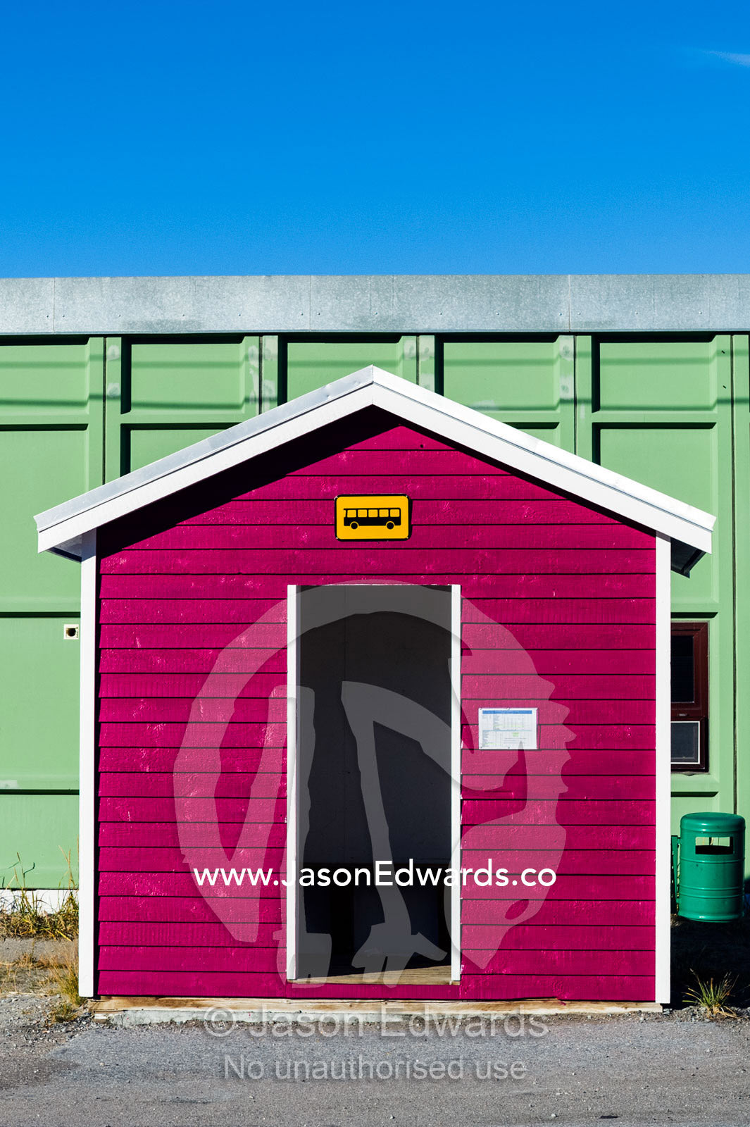 A colourful bus stop shelter in an arctic village. Kangerlussuaq, Qeqqata Municipality, Greenland.