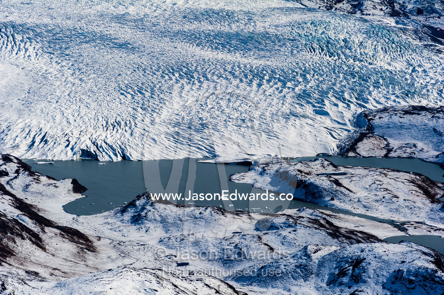 An ice-marginal lake adjacent to the Greenland Ice Sheet. Russell Glacier, Greenland Ice Sheet, Qeqqata Municipality, Kangerlussuaq, Greenland.