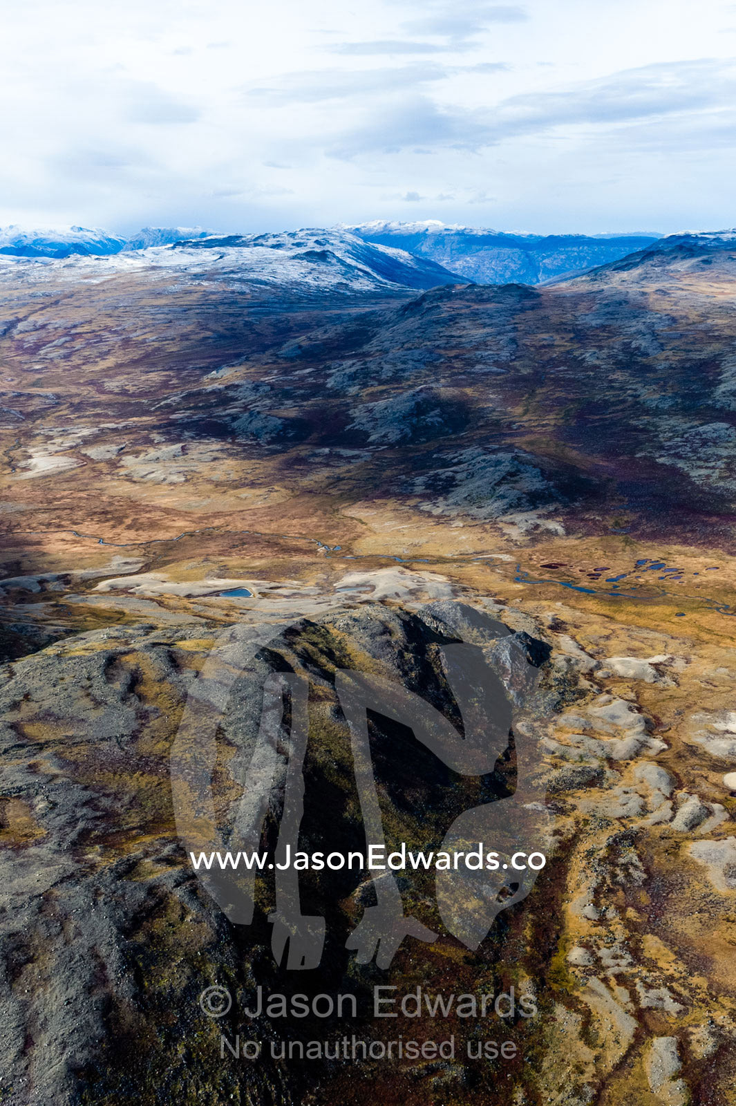 Barren rocky mountains on a highland tundra. Tarajornitsut Highlands, Qeqqata Municipality, Kangerlussuaq, Greenland.