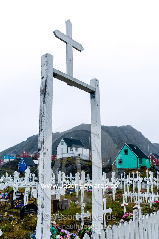 A crucifix at the gate of a fishing village cemetery. Maniitsoq, Sukkertoppen, Qeqqata Municipality, Greenland.