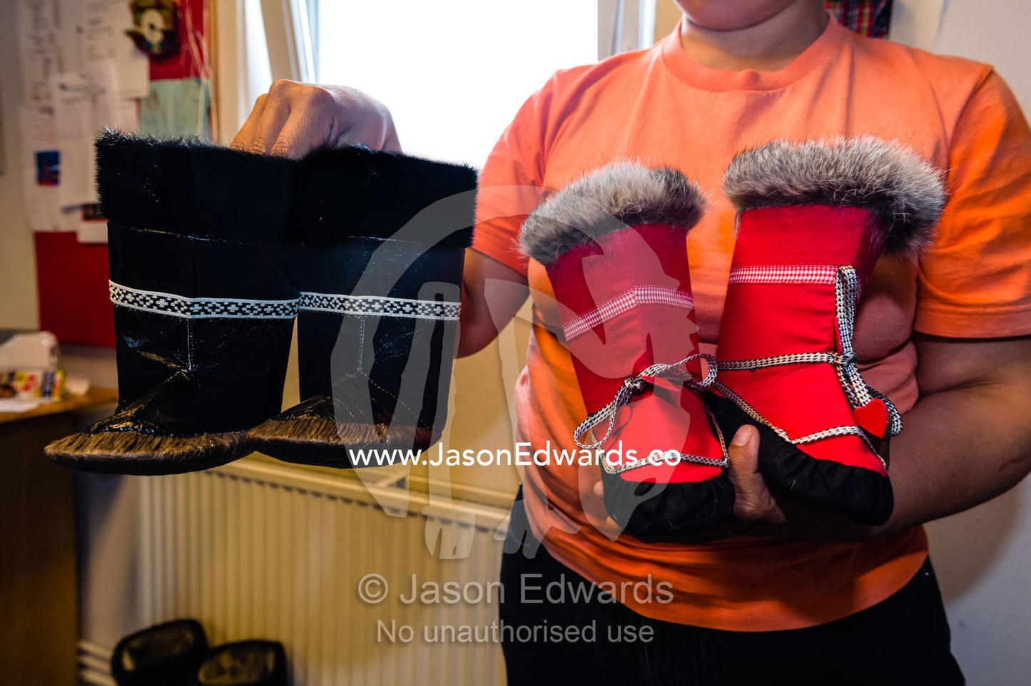 Mukluks or Kamik are a soft boot traditionally made of reindeer skin or sealskin and were originally worn by Arctic aboriginal people, including the Inuit and Yupik. Kangaamiut, Gammel Sukkertoppen, Qeqqata Municipality, Greenland.