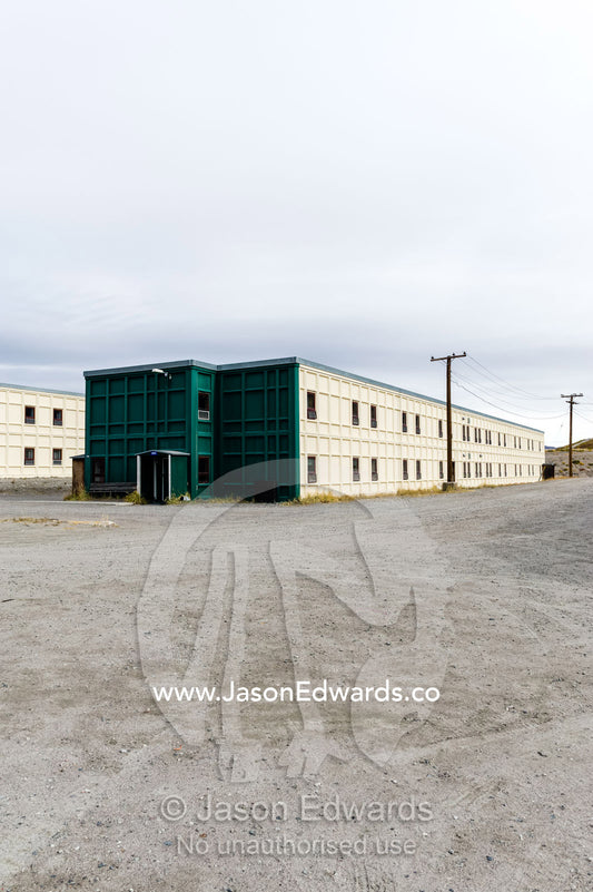 Prefabricated steel buildings in an arctic village designed to survive winter storms. Kangerlussuaq, Qeqqata Municipality, Greenland.