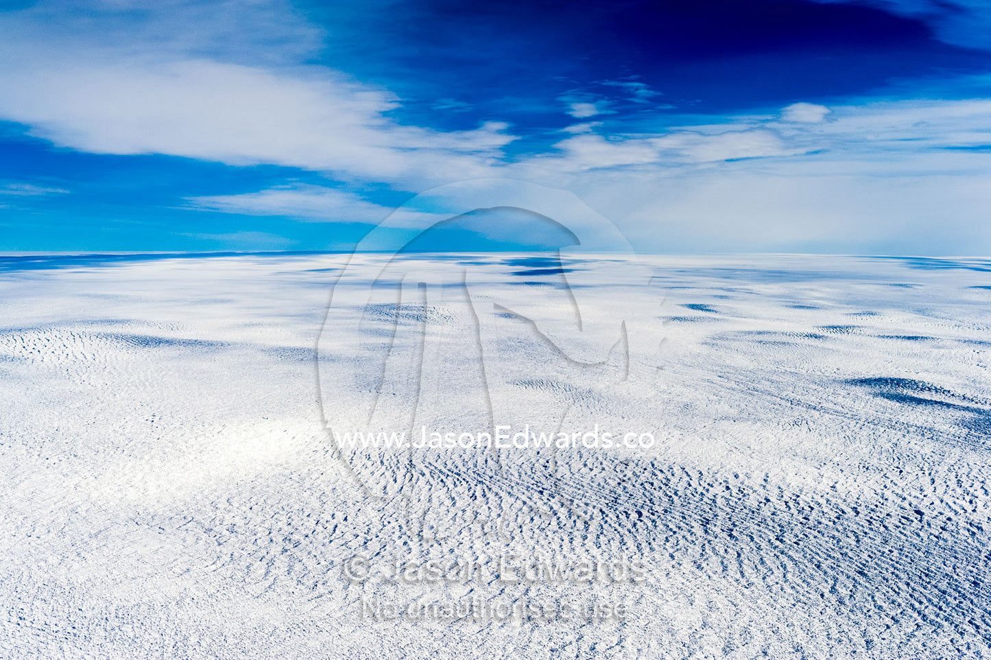Pressure ridges on the vast barren plain of the Greenland Ice Sheet. Greenland Ice Sheet, Qeqqata Municipality, Kangerlussuaq, Greenland.