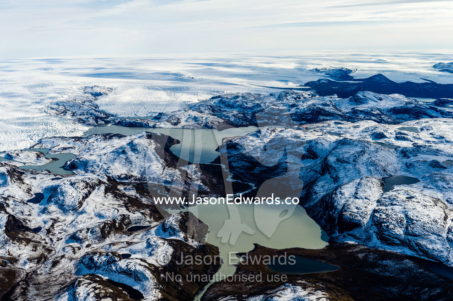An ice-marginal lake adjacent to the Greenland Ice Sheet. Tarajornitsut Highlands, Greenland Ice Sheet, Qeqqata Municipality, Kangerlussuaq, Greenland.