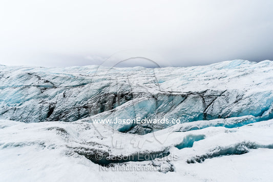 The frozen and barren wasteland of ice and crevasse on the surface of the Greenland Ice Sheet. Greenland Ice Sheet, Qeqqata Municipality, Kangerlussuaq, Greenland.