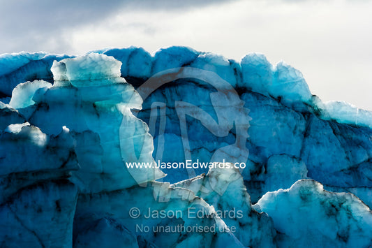 Treacherous jagged ice spires on a glacier fracture zone known as serac. Russell Glacier, Greenland Ice Sheet, Qeqqata Municipality, Kangerlussuaq, Greenland.