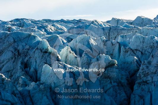 Treacherous jagged ice spires on a glacier fracture zone known as serac. Russell Glacier, Greenland Ice Sheet, Qeqqata Municipality, Kangerlussuaq, Greenland.