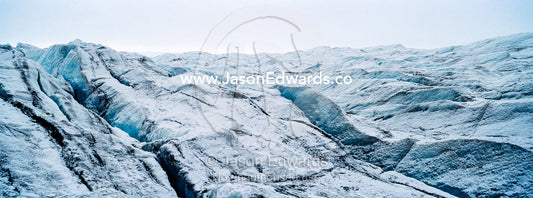 The frozen and barren wasteland of folded ice and crevasse on the surface of the Greenland Ice Sheet. Greenland Ice Sheet, Qeqqata Municipality, Kangerlussuaq, Greenland.