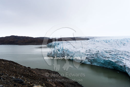 The fracture zone of a glacier on the Greenland Ice Sheet ending in a lake. Isunngua Highland, Greenland Ice Sheet, Kangerlussuaq, Qeqqata Municipality, Greenland.