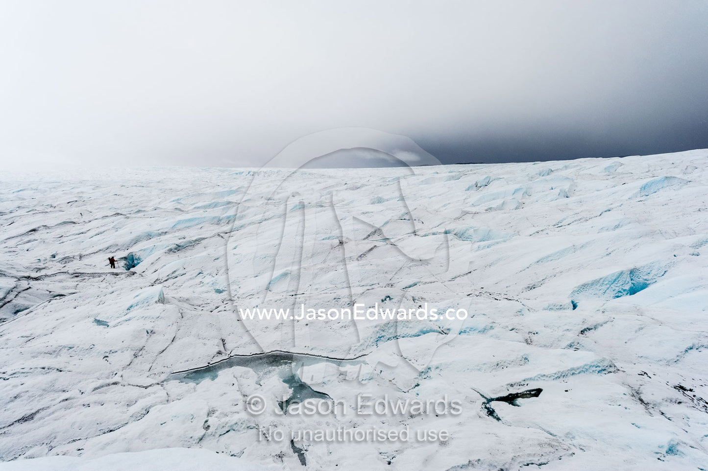 The frozen and barren wasteland of folded ice on the surface of the Greenland Ice Sheet. Greenland Ice Sheet, Qeqqata Municipality, Kangerlussuaq, Greenland.