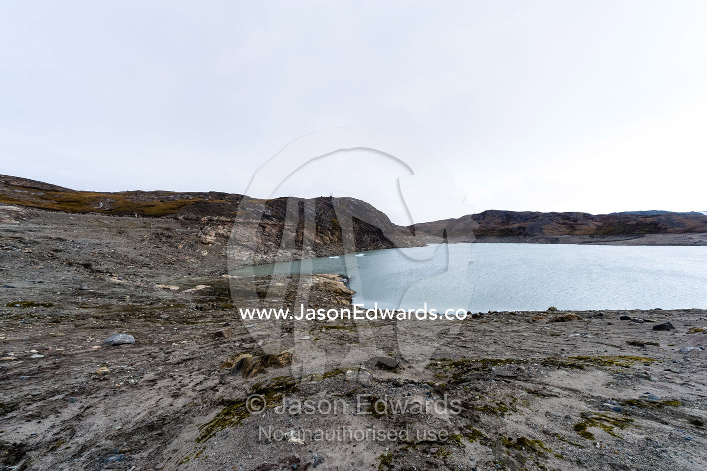 Gauge marks in a cliff face and shoreline where a receding glacier has scoured the rock. Isunngua Highland, Greenland Ice Sheet, Kangerlussuaq, Qeqqata Municipality, Greenland.