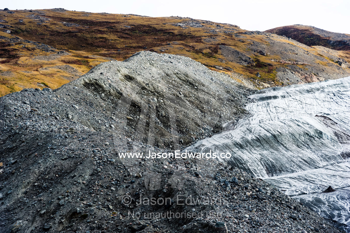 A pile of rock, sediment and silt debris deposited by the leading edge of a glacier. Russell Glacier, Greenland Ice Sheet, Qeqqata Municipality, Kangerlussuaq, Greenland.